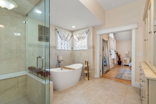 Bathroom, Free Standing Baths, Glass Shower, Interior, Recessed Lighting, Wood Texture Flooring
