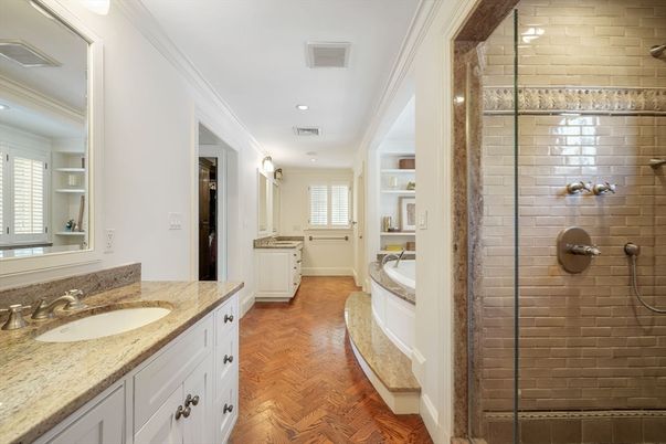 Bathroom, Dual Sink Vanities, Glass Shower, Interior, Recessed Lighting, Wood Texture Flooring