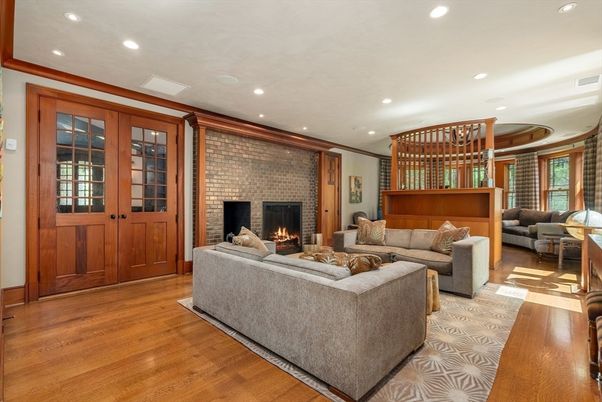 Fireplace, Interior, Living room, Recessed Lighting, Stone Walls, Wood Texture Flooring