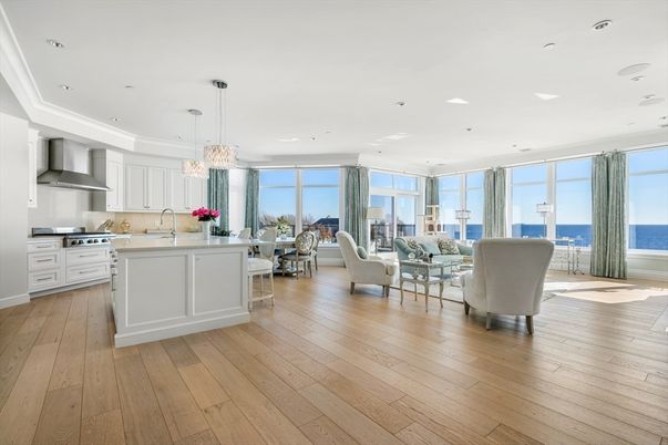 Chandelier, Dining room, Interior, Kitchen, Living room, Pendant Lights, Recessed Lighting, Stainless Steel Appliances, Water, Wood Texture Flooring
