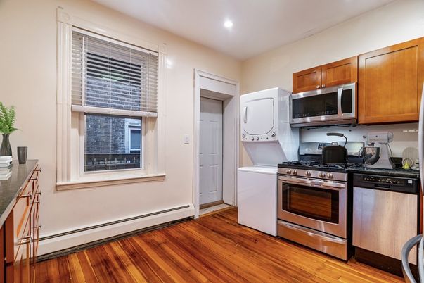 Interior, Kitchen, Recessed Lighting, Stainless Steel Appliances, Washer, Wood Texture Flooring