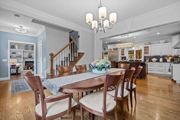 Chandelier, Dining room, Fireplace, Interior, Kitchen, Pendant Lights, Recessed Lighting, Wood Texture Flooring