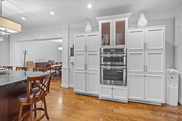 Dining room, Interior, Kitchen, Recessed Lighting, Stainless Steel Appliances, Wood Texture Flooring
