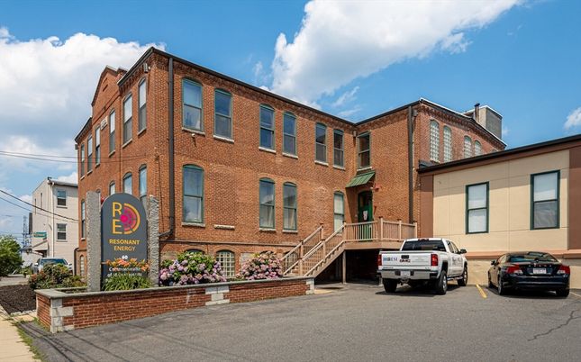 Exterior, Facade, Brick Facade, Condo Building