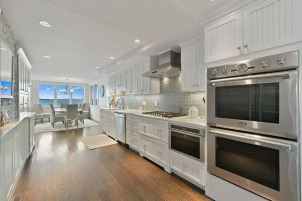 Chandelier, Dining room, Interior, Kitchen, Recessed Lighting, Stainless Steel Appliances, Water, Wood Texture Flooring