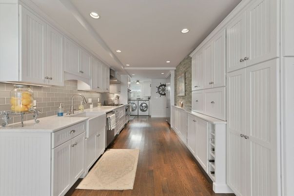 Interior, Kitchen, Recessed Lighting, Washer, Wood Texture Flooring
