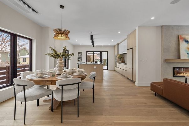 Dining room, Fireplace, Interior, Living room, Pendant Lights, Recessed Lighting, Wood Texture Flooring