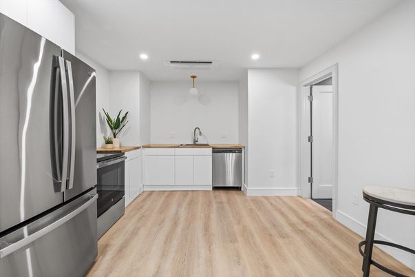 Interior, Kitchen, Pendant Lights, Recessed Lighting, Stainless Steel Appliances, Wood Texture Flooring