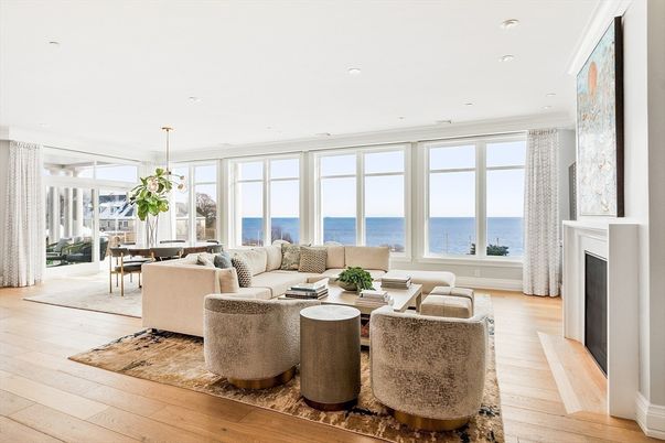 Dining room, Fireplace, Interior, Living room, Pendant Lights, Recessed Lighting, Water, Wood Texture Flooring