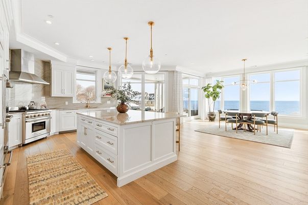 Dining room, Interior, Kitchen, Pendant Lights, Recessed Lighting, Stainless Steel Appliances, Water, Wood Texture Flooring