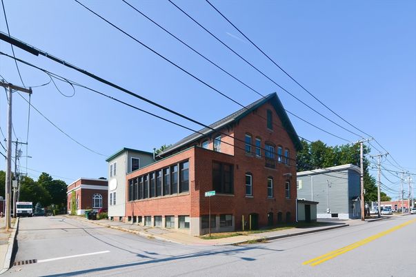 Exterior, Facade, Brick Facade, Condo Building