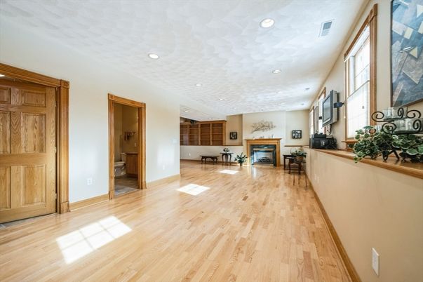 Empty room, Fireplace, Interior, Recessed Lighting, Wood Texture Flooring