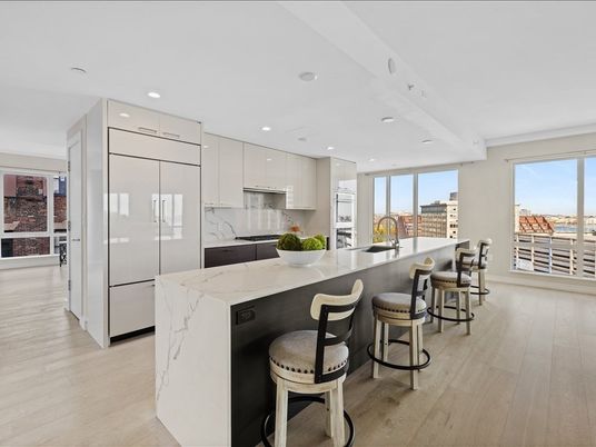Interior, Kitchen, Marble Walls, Recessed Lighting, Stainless Steel Appliances, Wood Texture Flooring