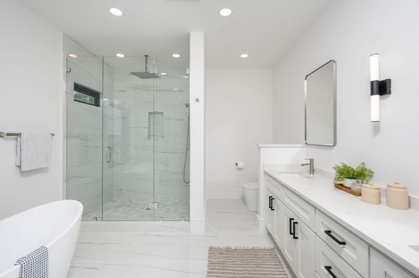 Bathroom, Dual Sink Vanities, Free Standing Baths, Glass Shower, Interior, Marble, Marble Walls, Recessed Lighting