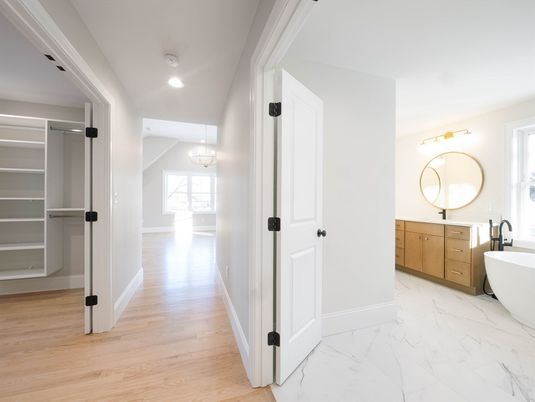 Bathroom, Chandelier, Free Standing Baths, Interior, Marble, Recessed Lighting, Walk-in Closets, Wood Texture Flooring