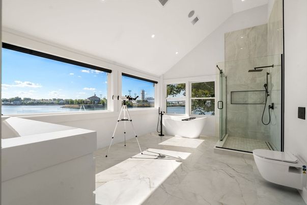 Bathroom, Free Standing Baths, Glass Shower, Interior, Marble, Marble Walls, Recessed Lighting, Water
