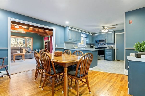 Dining room, Interior, Kitchen, Living room, Recessed Lighting, Stainless Steel Appliances, Wood Texture Flooring
