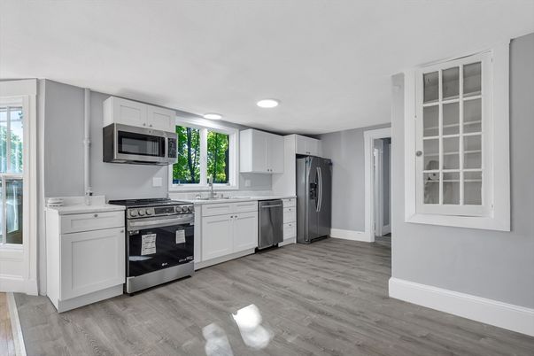Interior, Kitchen, Recessed Lighting, Stainless Steel Appliances, Wood Texture Flooring