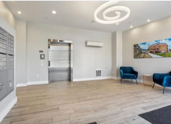 Elevator, Interior, Pendant Lights, Recessed Lighting, Wood Texture Flooring