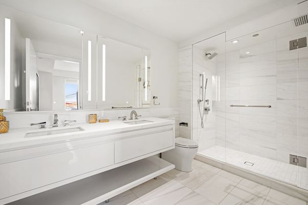 Bathroom, Dual Sink Vanities, Glass Shower, Interior, Marble Walls, Recessed Lighting