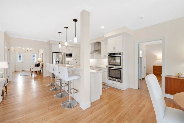 Dining room, Interior, Kitchen, Pendant Lights, Recessed Lighting, Stainless Steel Appliances, Wood Texture Flooring
