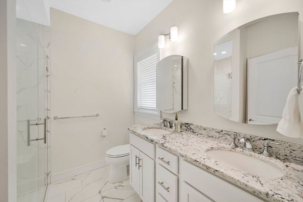 Bathroom, Dual Sink Vanities, Glass Shower, Interior, Marble, Marble Walls