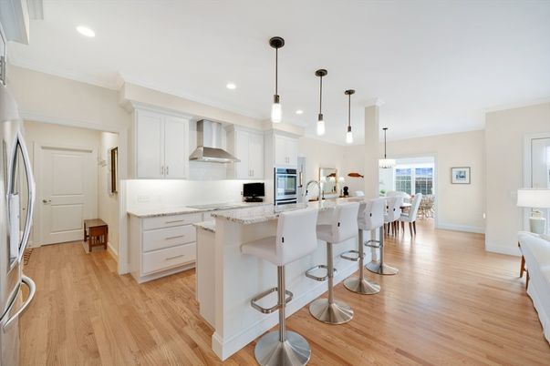 Dining room, Interior, Kitchen, Pendant Lights, Recessed Lighting, Stainless Steel Appliances, Wood Texture Flooring