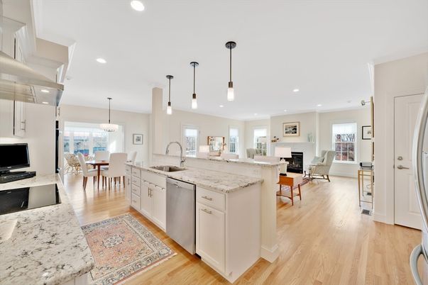 Dining room, Fireplace, Interior, Kitchen, Living room, Pendant Lights, Recessed Lighting, Stainless Steel Appliances, Wood Texture Flooring