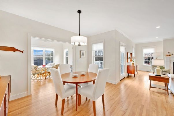 Dining room, Fireplace, Interior, Living room, Pendant Lights, Recessed Lighting, Wood Texture Flooring