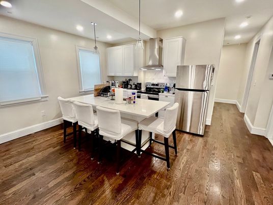 Dining room, Interior, Kitchen, Pendant Lights, Recessed Lighting, Stainless Steel Appliances, Wood Texture Flooring