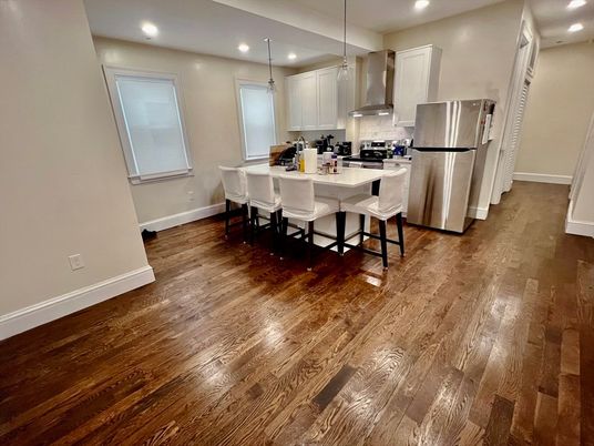 Dining room, Interior, Kitchen, Pendant Lights, Recessed Lighting, Stainless Steel Appliances, Wood Texture Flooring