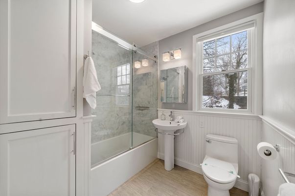 Bathroom, Glass Shower, Interior, Marble Walls, Recessed Lighting, Wood Texture Flooring