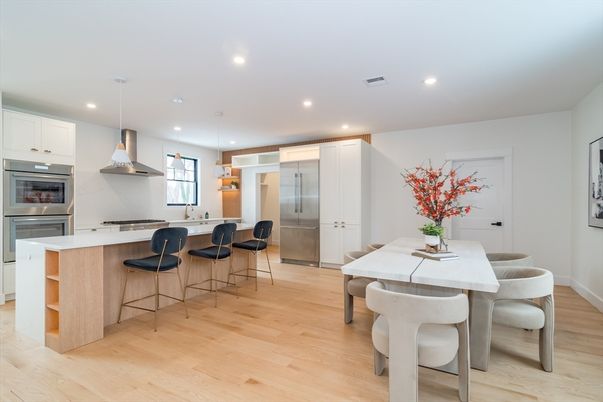 Dining room, Interior, Kitchen, Pendant Lights, Recessed Lighting, Stainless Steel Appliances, Wood Texture Flooring