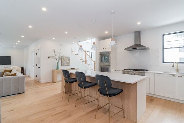 Interior, Kitchen, Marble Walls, Pendant Lights, Recessed Lighting, Stainless Steel Appliances, Wood Texture Flooring