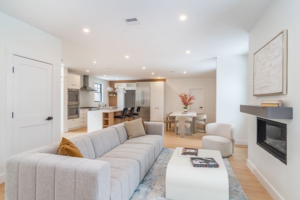 Dining room, Fireplace, Interior, Kitchen, Living room, Recessed Lighting, Stainless Steel Appliances, Wood Texture Flooring