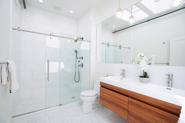 Bathroom, Dual Sink Vanities, Glass Shower, Interior, Marble Walls, Pendant Lights, Recessed Lighting