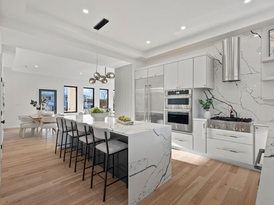 Dining room, Interior, Kitchen, Marble Walls, Pendant Lights, Recessed Lighting, Stainless Steel Appliances, Wood Texture Flooring