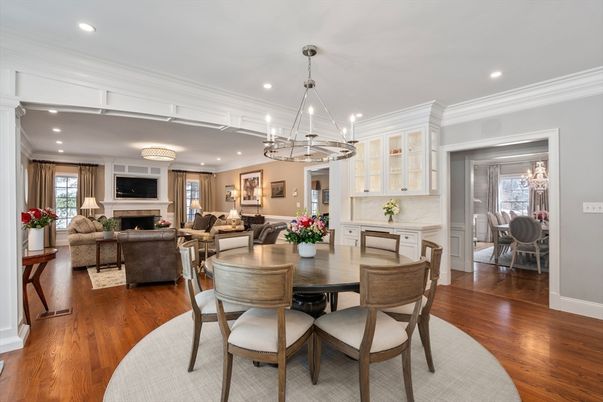 Chandelier, Dining room, Fireplace, Interior, Living room, Pendant Lights, Recessed Lighting, Wood Texture Flooring
