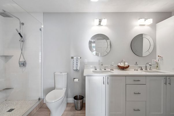 Bathroom, Dual Sink Vanities, Glass Shower, Interior, Wood Texture Flooring