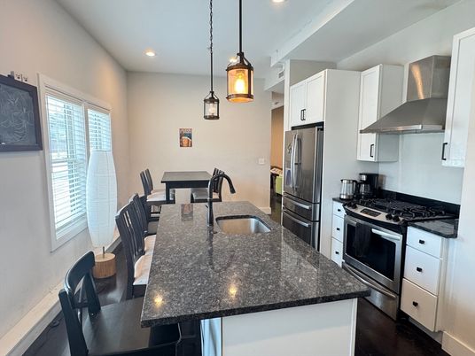 Dining room, Interior, Kitchen, Pendant Lights, Recessed Lighting, Stainless Steel Appliances, Wood Texture Flooring