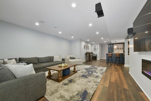 Dining room, Fireplace, Interior, Living room, Pendant Lights, Recessed Lighting, Wood Texture Flooring