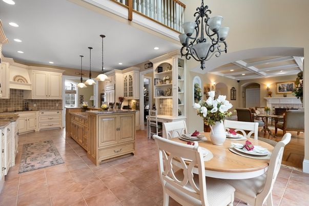Chandelier, Dining room, Fireplace, Interior, Kitchen, Living room, Pendant Lights, Recessed Lighting, Stainless Steel Appliances