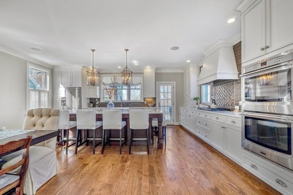 Chandelier, Interior, Kitchen, Pendant Lights, Recessed Lighting, Stainless Steel Appliances, Wood Texture Flooring