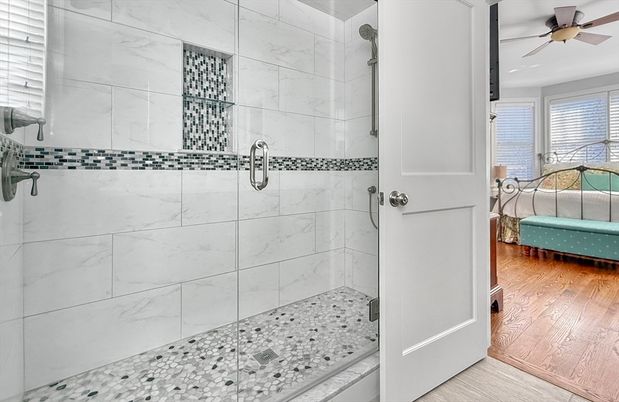 Bathroom, Glass Shower, Interior, Marble Walls, Wood Texture Flooring