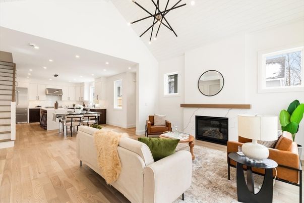 Dining room, Fireplace, Interior, Kitchen, Living room, Pendant Lights, Recessed Lighting, Stainless Steel Appliances, Wood Texture Flooring
