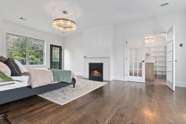 Bedroom, Chandelier, Fireplace, Interior, Wood Texture Flooring