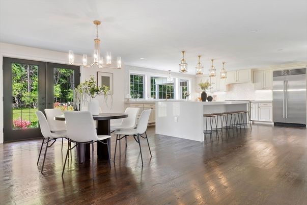 Chandelier, Dining room, Interior, Kitchen, Pendant Lights, Recessed Lighting, Stainless Steel Appliances, Wood Texture Flooring