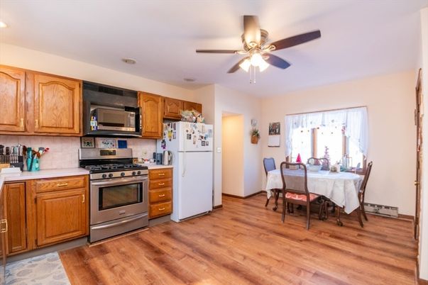 Dining room, Interior, Kitchen, Recessed Lighting, Stainless Steel Appliances, Wood Texture Flooring