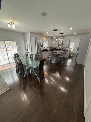 Dining room, Interior, Kitchen, Pendant Lights, Recessed Lighting, Stainless Steel Appliances, Wood Texture Flooring