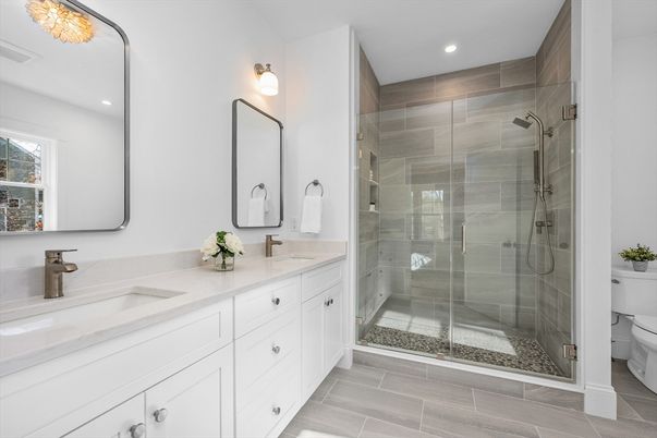 Bathroom, Dual Sink Vanities, Glass Shower, Interior, Recessed Lighting, Wood Texture Flooring